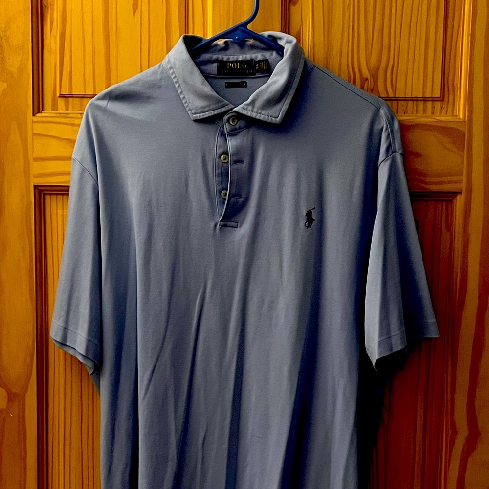 Used Beautiful baby blue powder polo shirt.